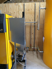 Biomass boiler fuel hopper and pipework