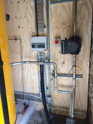 Biomass boiler pipework and pump