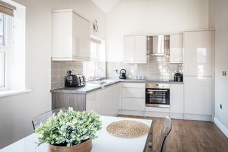 Fitted kitchen in white