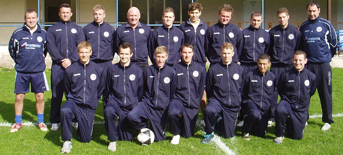 Llangollen Football Club team in their tracksuits sponsored by Worcester Bosch and AW Renewables Ltd