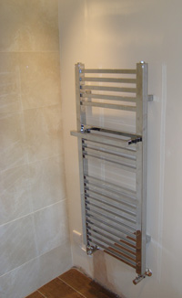 A heated towel rail installed in a bathroom