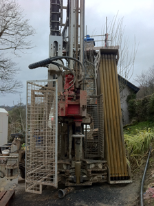 Drilling Rig for a bore hole collector